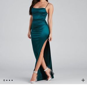 Teal formal tight fitting dress.